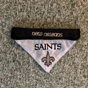 New Orleans Saints dog bandana. Still in original packaging -no tags. Size S/M.